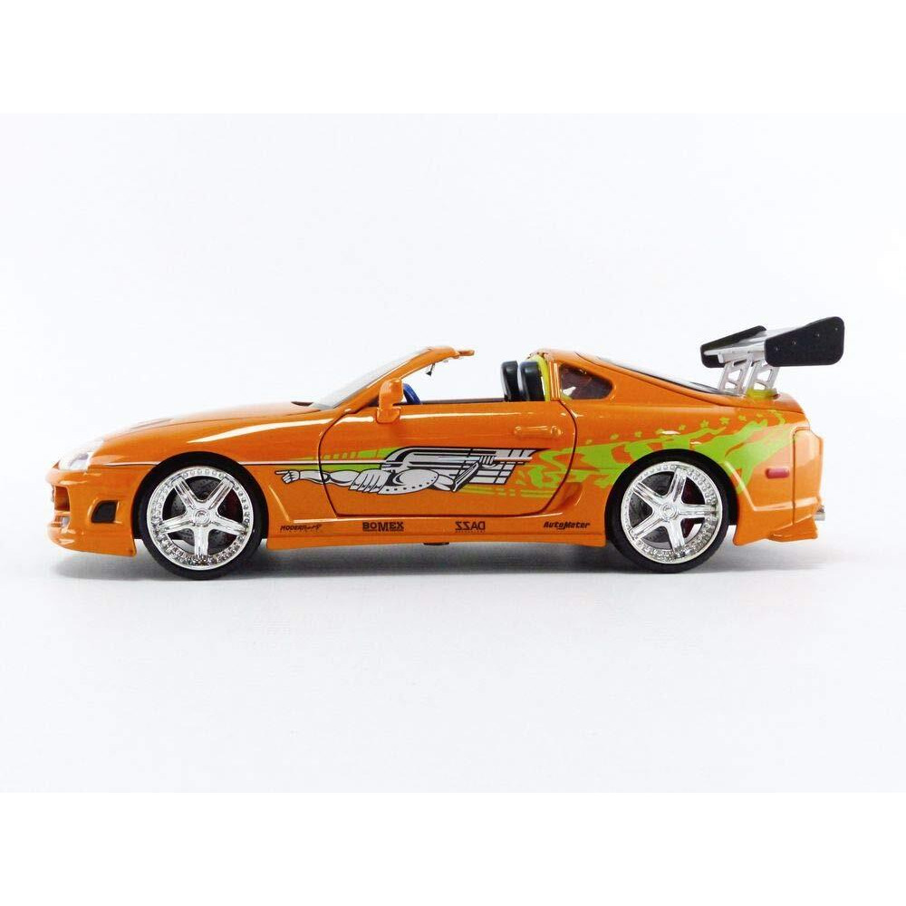 Toyota Supra Orange Metallic with Brian Diecast Figurine &quotFast & Furious" Movie 1/24 Diecast Model Car by Jada