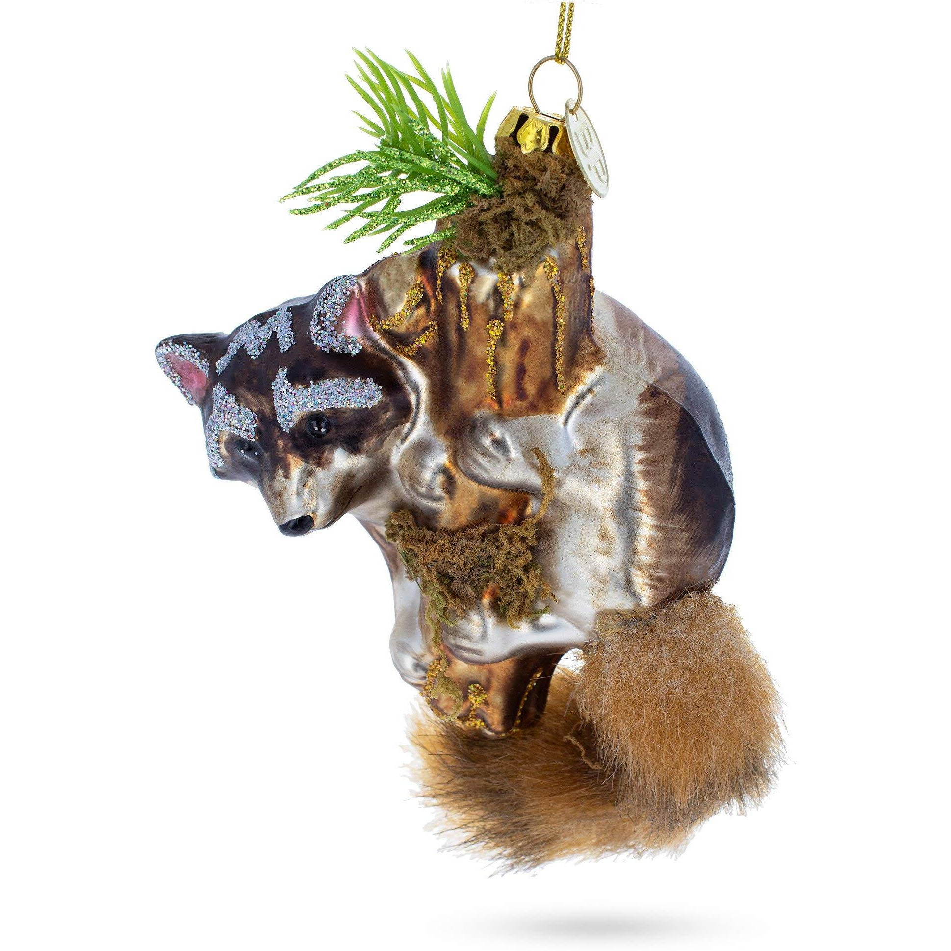 Curious Raccoon Climbing The Tree - Blown Glass Christmas Ornament