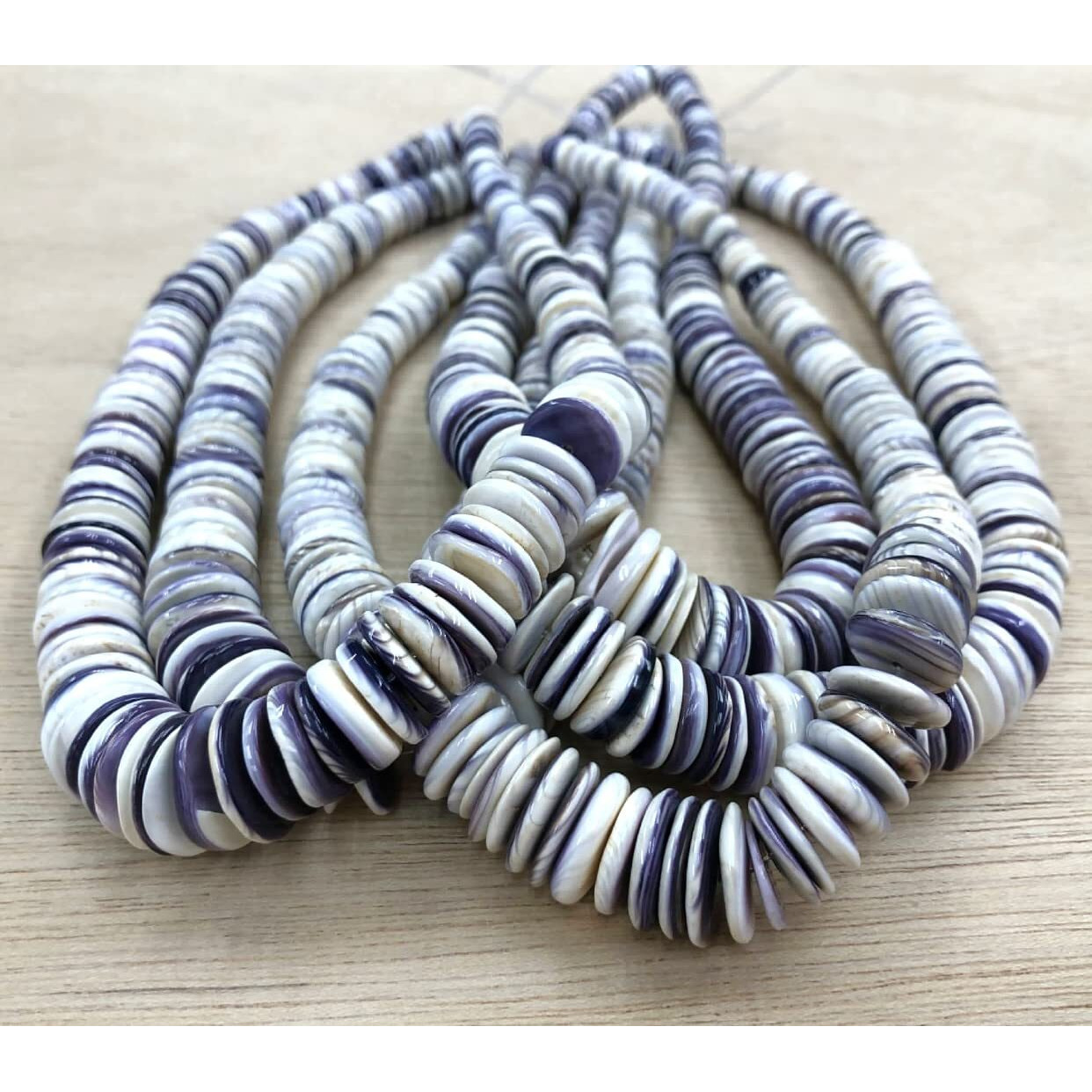 Abcgems Snowy-White Wampum Shell Beads With Lavender Tone - Found In Ma  Ri  Ny (America's First Currency Year 1637-1673) Native American Style Graduated Rondelle 8-16Mm (16 Inches Length)