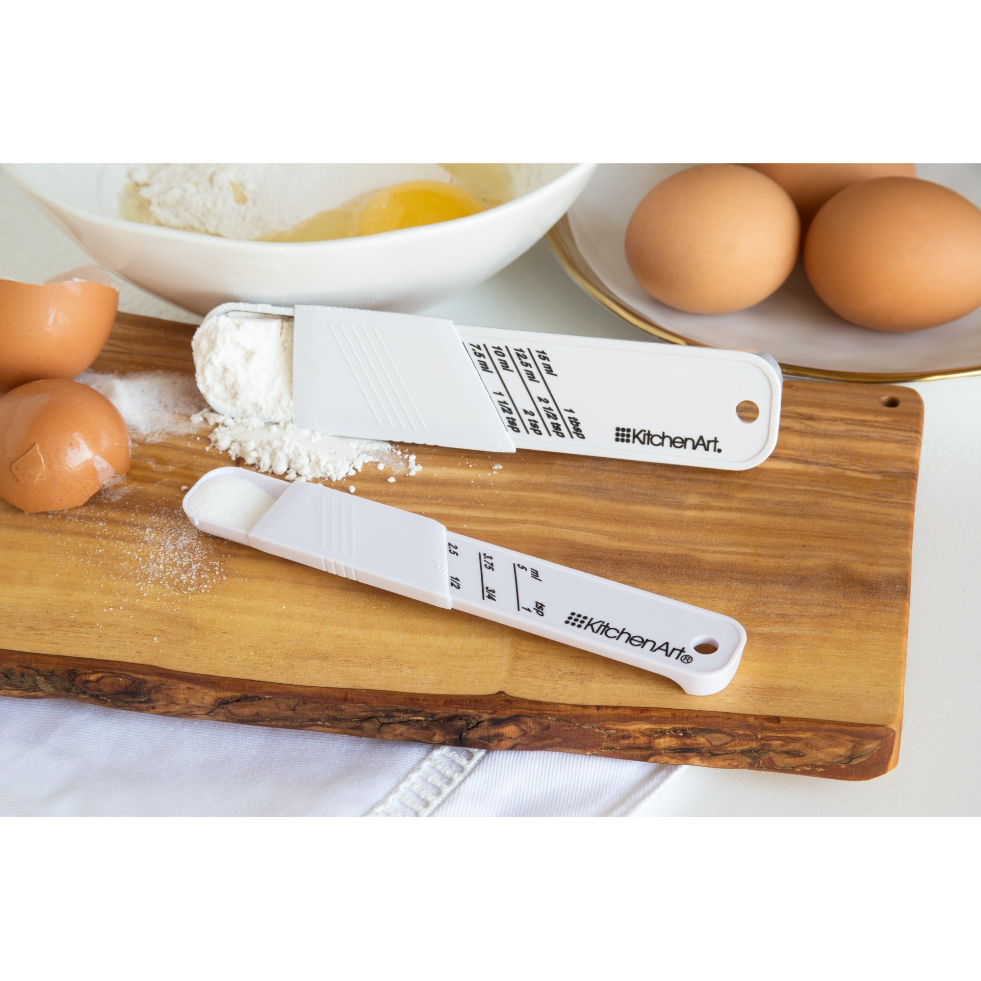 Kitchenart Adjust-A-Teaspoon And Adjust-A-Tablespoon Set  Plastic  2-Piece  White 9 X 3.5 X 0.75 Inches