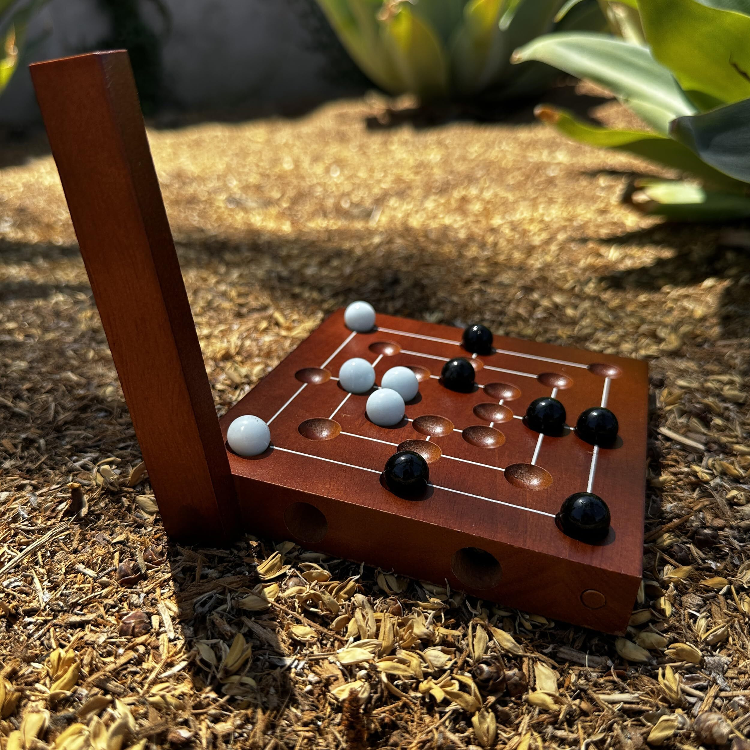 We Games Nine Men's Morris Board Game  5 Inch Travel Size - Solid Wood Board With Magnetic Closure  9 White & Black Marbles  Classic 2-Player Strategy Game For Adults  Perfect For Game Nights