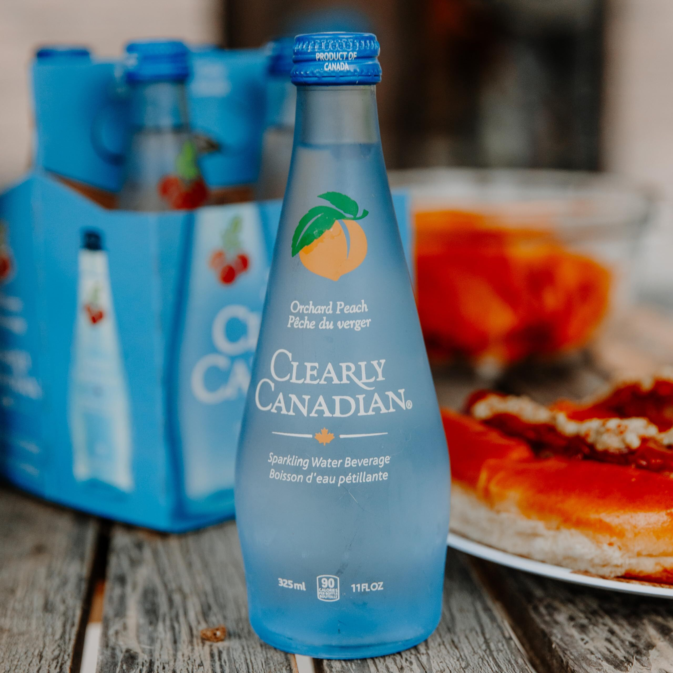 Clearly Canadian Orchard Peach Sparkling Spring Water Beverage, Natural & Carbonated, Flavored Seltzer Water, 1 Case (12 Bottles X 325Ml)