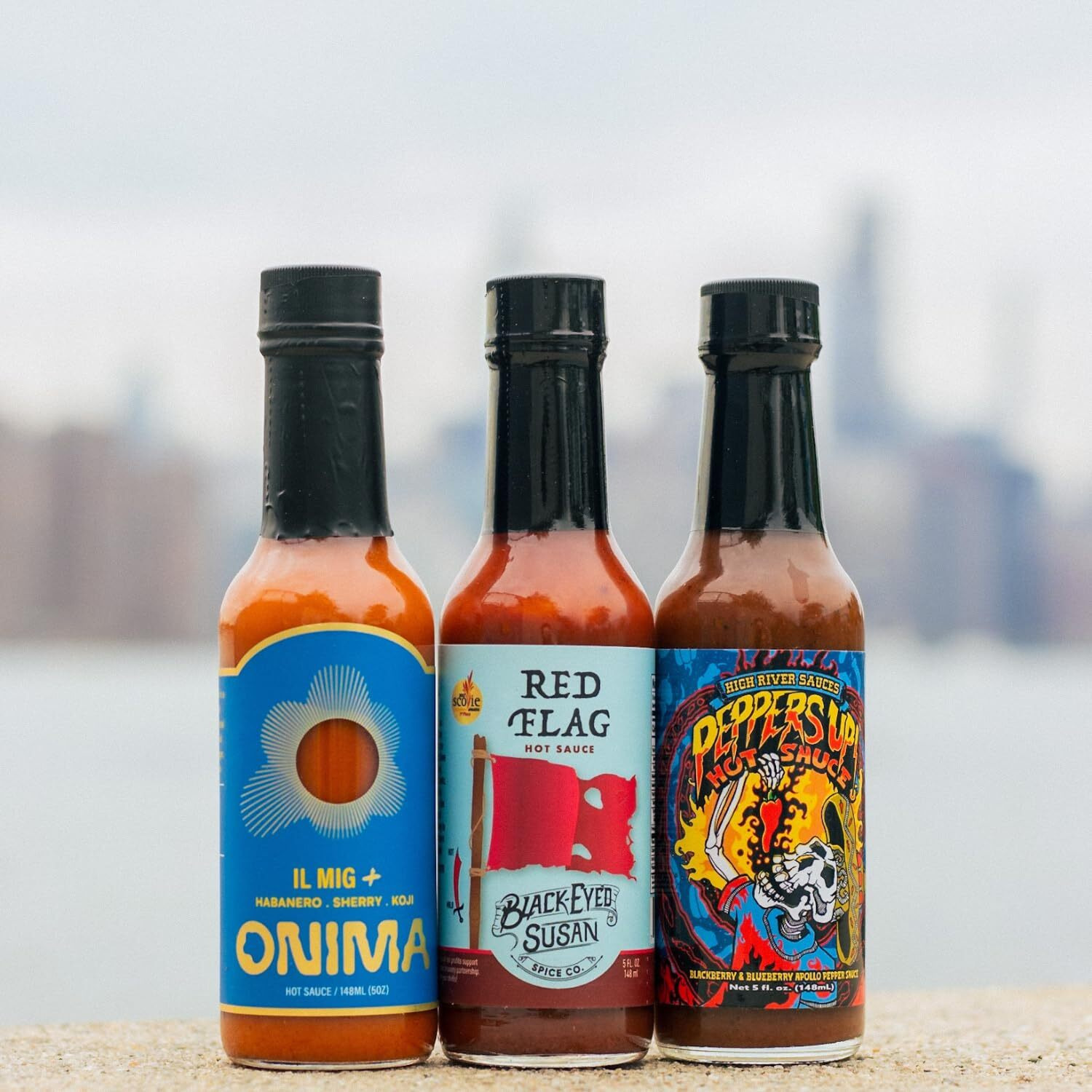 Hot Ones Season 24 Heat Pack, Hot Sauce Pack With Onima (Il Mig+), Black-Eyed Susan (Red Flag), High River Sauces (Peppers Up), Made With All Natural Ingredients, 5 Fl Oz Bottles (3-Pack)