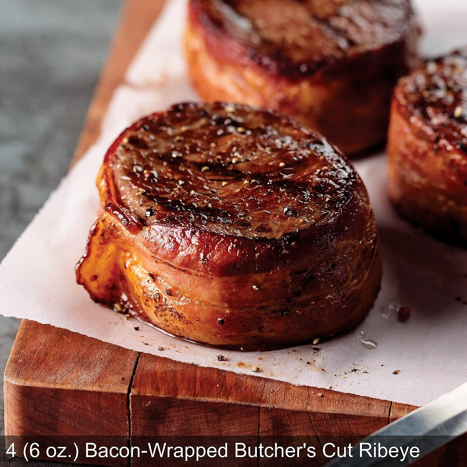 Omaha Steaks Deluxe Ribeye Gift Box (4 Bacon-Wrapped Ribeyes, 4 Omaha Steaks Burgers, 4 Gourmet Jumbo Franks, 4 Potatoes Au Gratin, 4 Caramel Apple Tartlets, 1 Jar Seasoning)