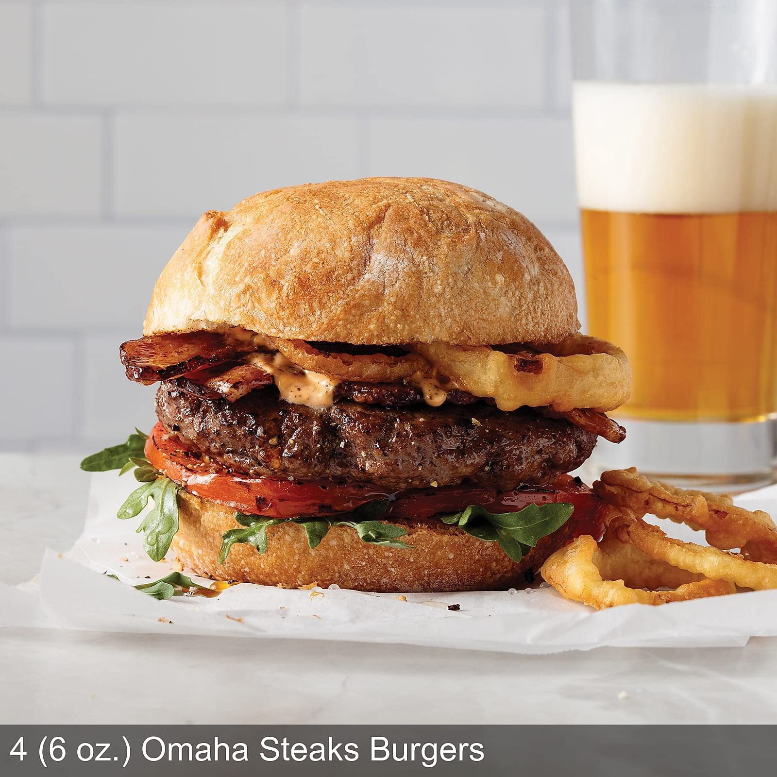 Omaha Steaks Deluxe Ribeye Gift Box (4 Bacon-Wrapped Ribeyes, 4 Omaha Steaks Burgers, 4 Gourmet Jumbo Franks, 4 Potatoes Au Gratin, 4 Caramel Apple Tartlets, 1 Jar Seasoning)