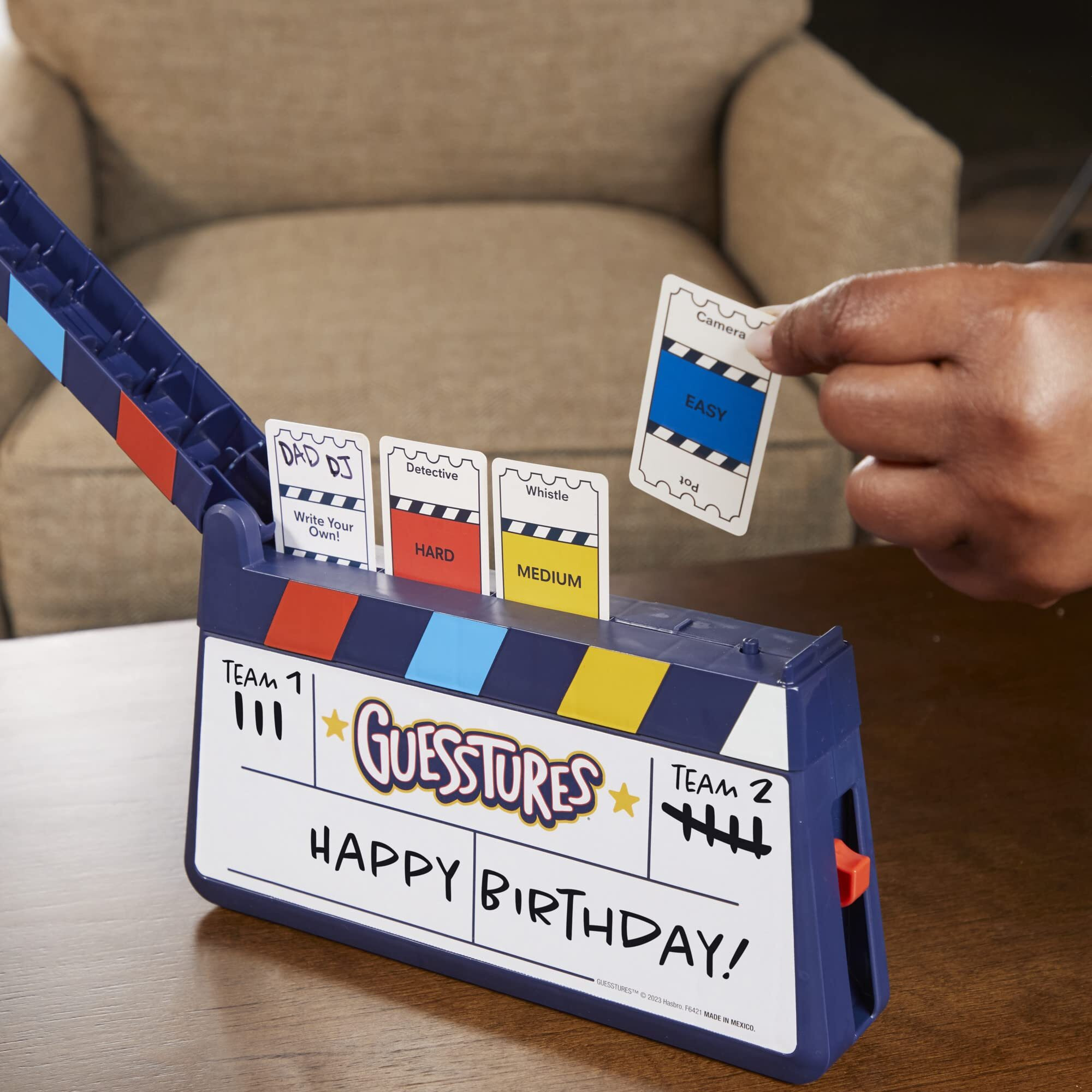 Hasbro Gaming Guesstures Game, Charades Game For 4 Or More Players, Includes Customizable Cards And Clapper, Family Party Game For Ages 8 And Up