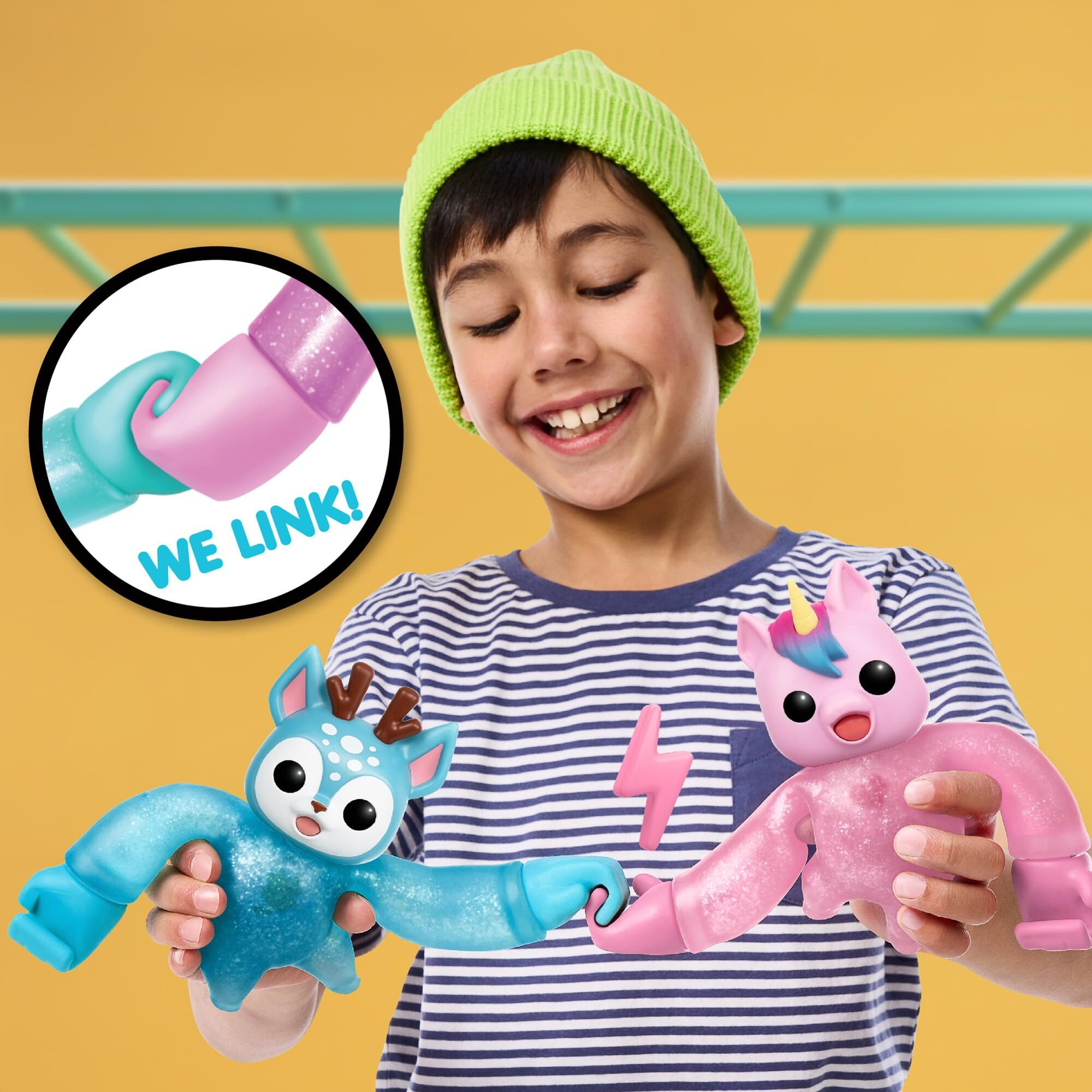 Little Live Pets Hug N' Hang Zoogooz - Uoolla Unicorn. Interactive Electronic Squishy Stretchy Toy Pet With 70+ Sounds & Reactions. Stretch, Squish & Link Their Hands. Display Them & Hang Them Around