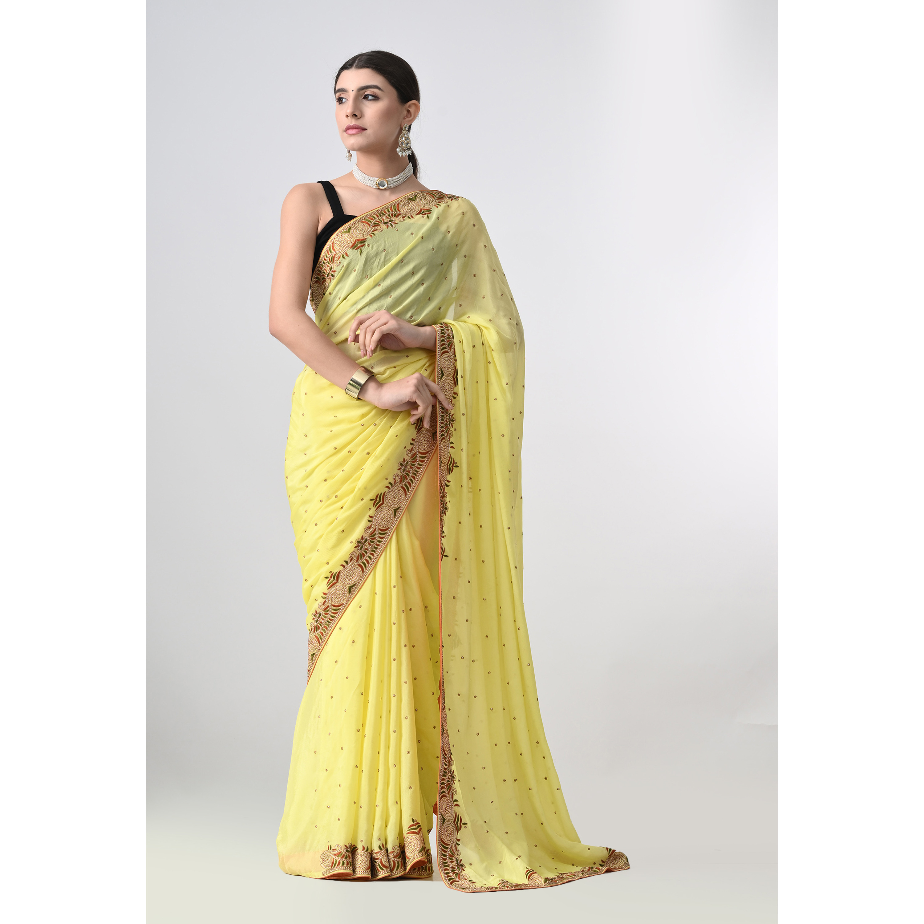 The Weavers Shop By Raavi Hand Embroidery Taaka Work Chinnon Chiffon Saree Yellow