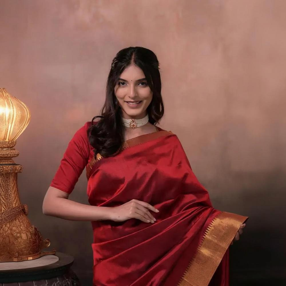 Bhadra - Reddish Maroon Plain Handwoven Silk Saree With Gold Zari Border