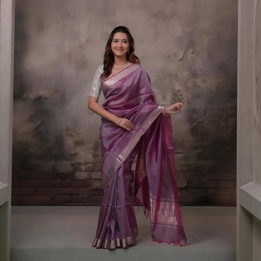 Bhadra - Pinkish Purple Plain Handwoven Silk Saree With Silver Zari Border