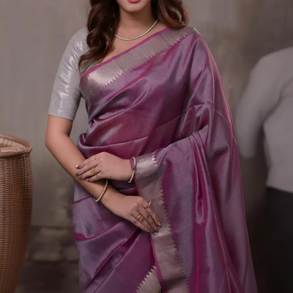 Bhadra - Pinkish Purple Plain Handwoven Silk Saree With Silver Zari Border