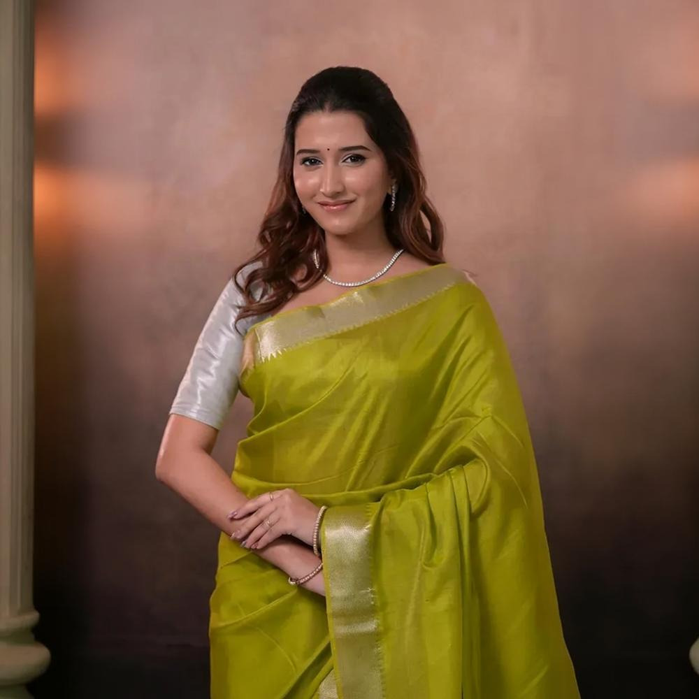 Bhadra - Lemon Green Plain Handwoven Silk Saree With Silver Zari Border