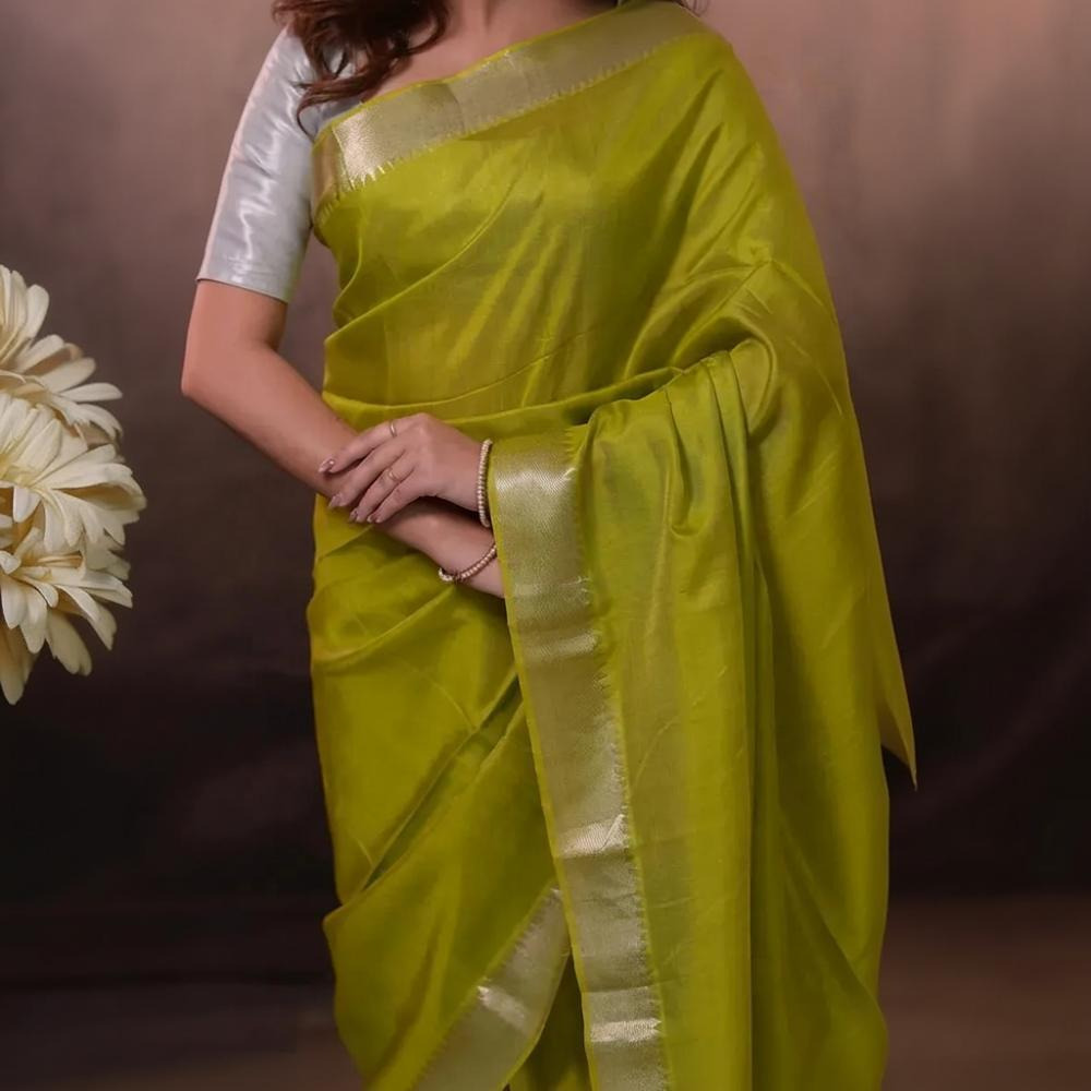Bhadra - Lemon Green Plain Handwoven Silk Saree With Silver Zari Border