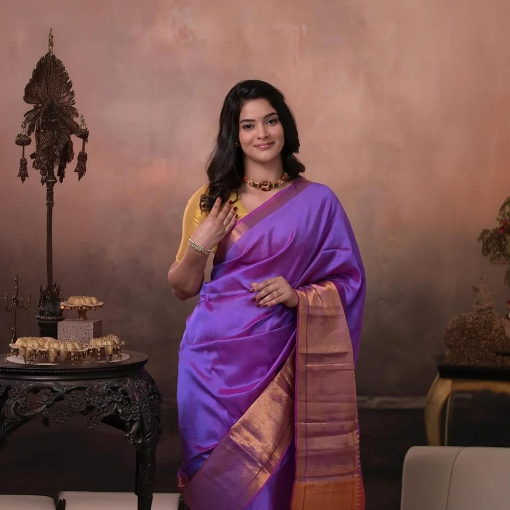 Bhadra - Lavender Pink Plain Handwoven Silk Saree With Gold Zari Border