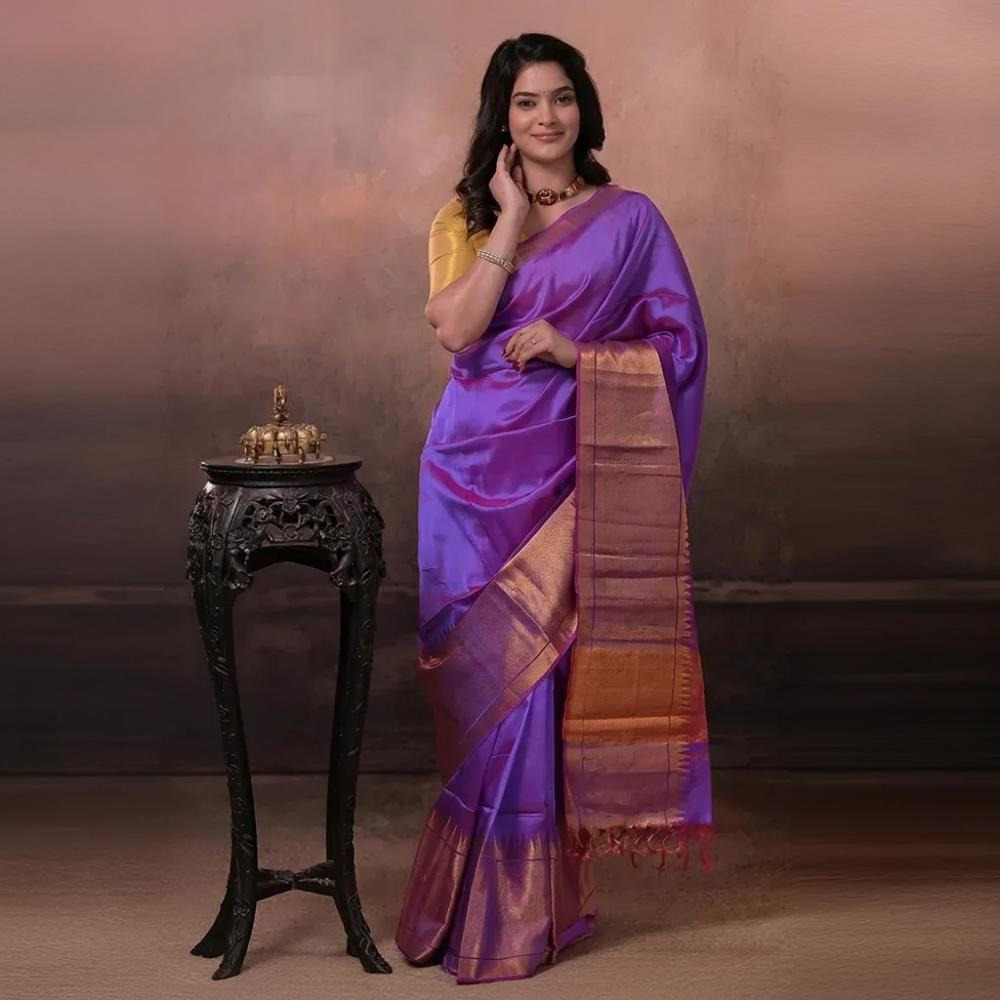 Bhadra - Lavender Pink Plain Handwoven Silk Saree With Gold Zari Border