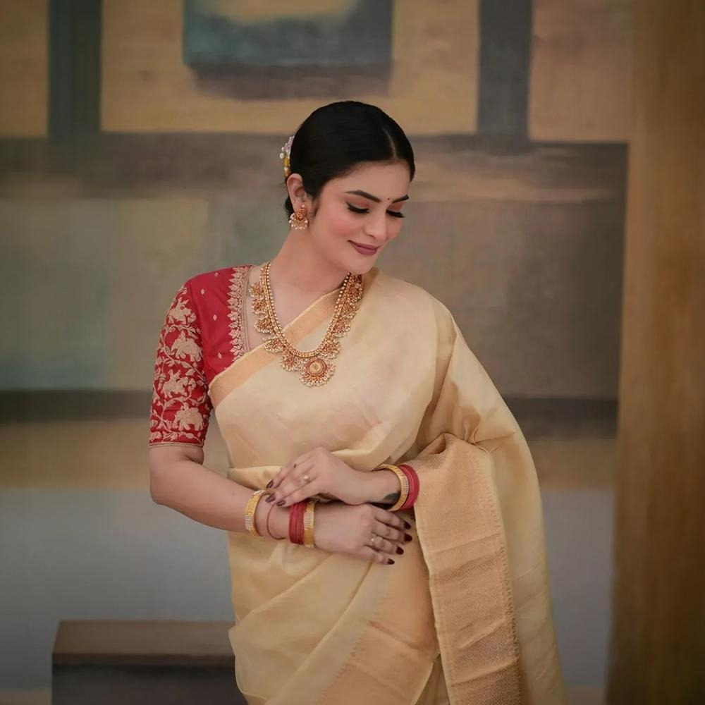 Bhadra - Beige Plain Handwoven And Handspun Silk Saree With Gold Zari Border