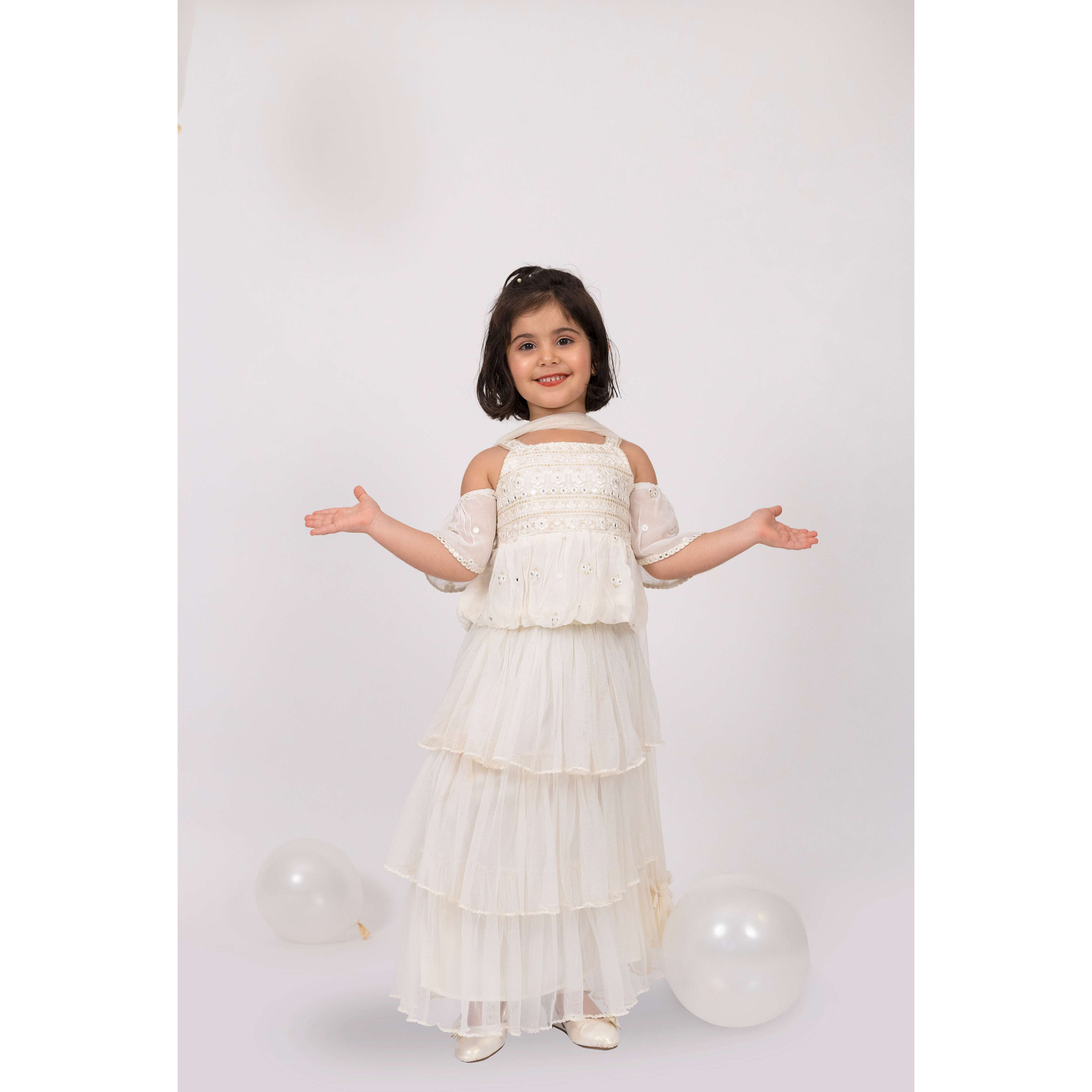 Elaisha Girls Embroidered Cold Shoulder Top & Tiered Ruffled Lehenga Set With Net Dupatta - Off White