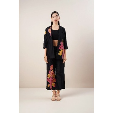 Black 3 piece Coord set in pure Chanderi Silk fabric. The multi- color patchwork and resham embroidery highlight the flow of the garment.