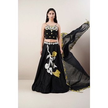 Chanderi silk Corset with Lehenga and Organza Dupatta.Hihlighted with Bold patchwork embroidery.